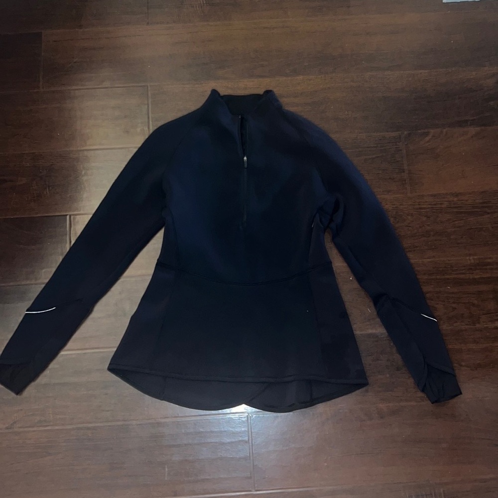 Black Lululemon peplum jacket size 10. Worn twice, great condition!